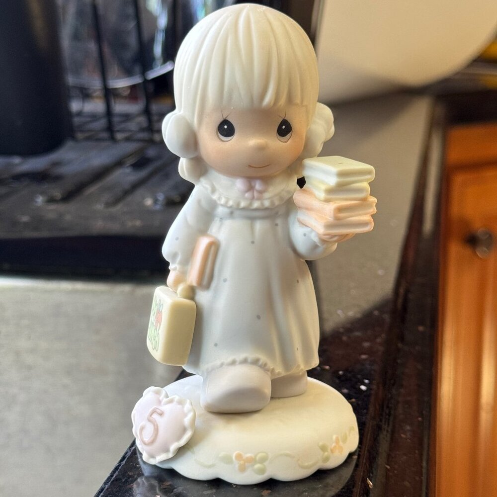 "Girl with Books, Age 5" Precious Moments Figurine